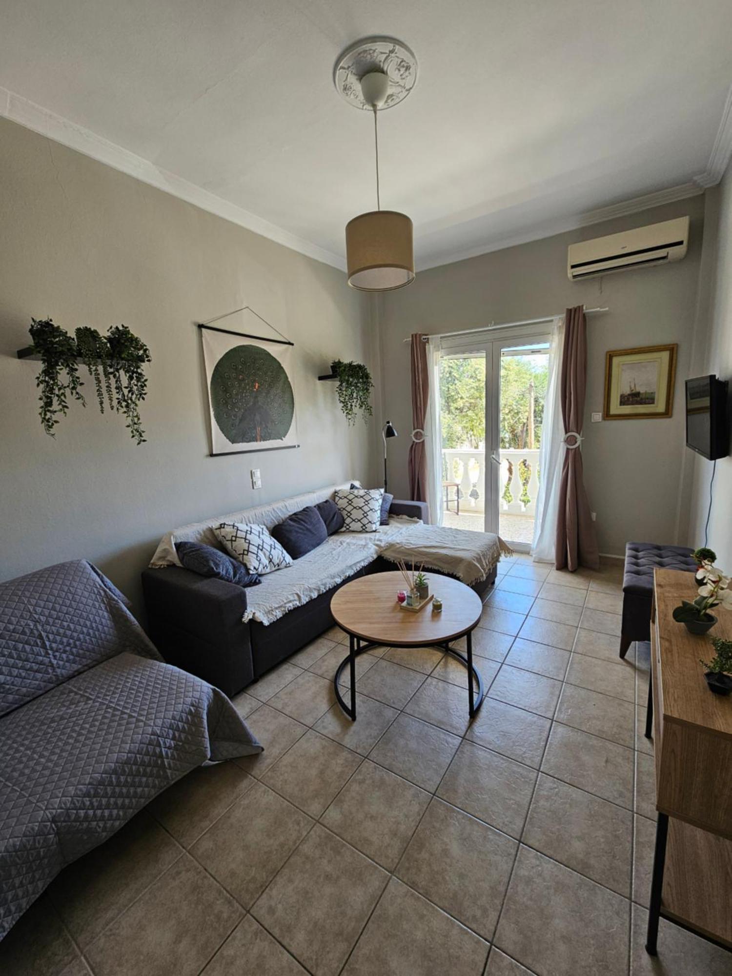 Tramonto Beach Apartment Ipsos Esterno foto